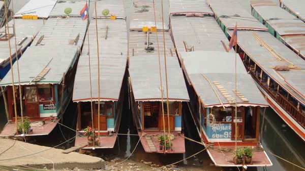 Boats waiting to transport people around Laos
